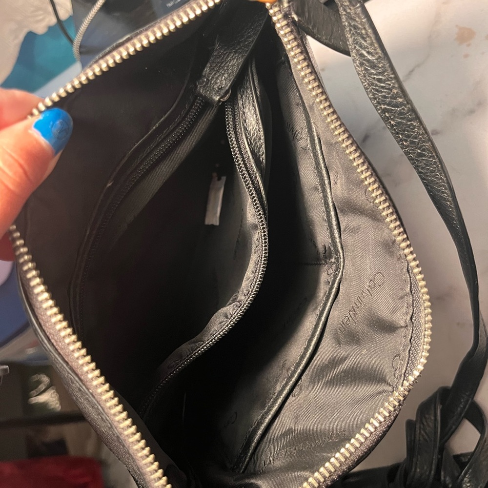 Used but in good conditions Calvin Klein Purse. Please also make me offers :)